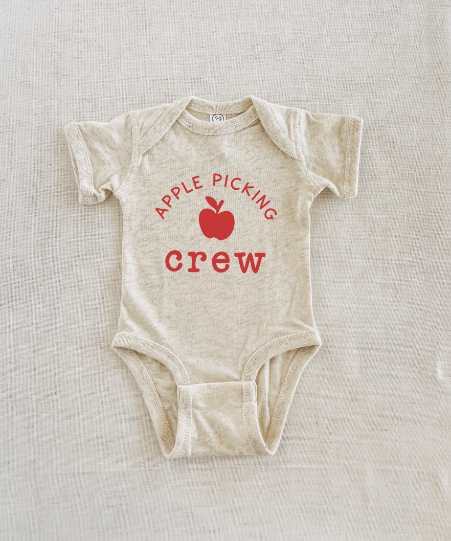 applepickingcrewinfantonesiemock.png