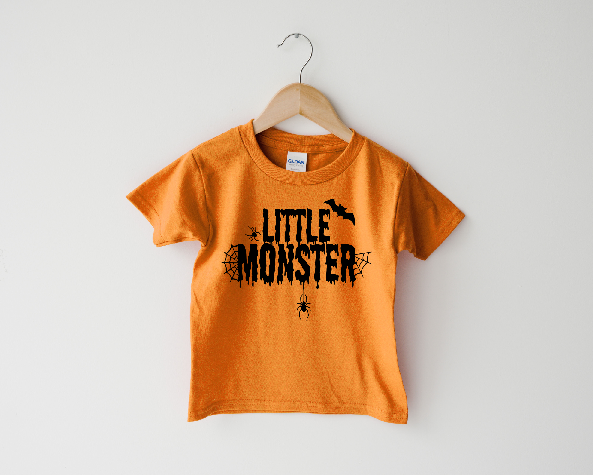 littlemonstertoddlerorangeteemock.png